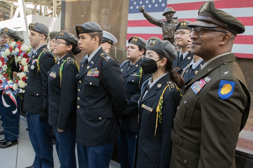 JROTC enrollment in eight CPS high schools has dropped by 67% since the 2020-21 school year. Brigadier General Rodney Boyd poses with JROTC members at the Veterans Day Ceremony at Soldier Field on Nov. 11, 2022.  Brian Rich/Sun-Times file